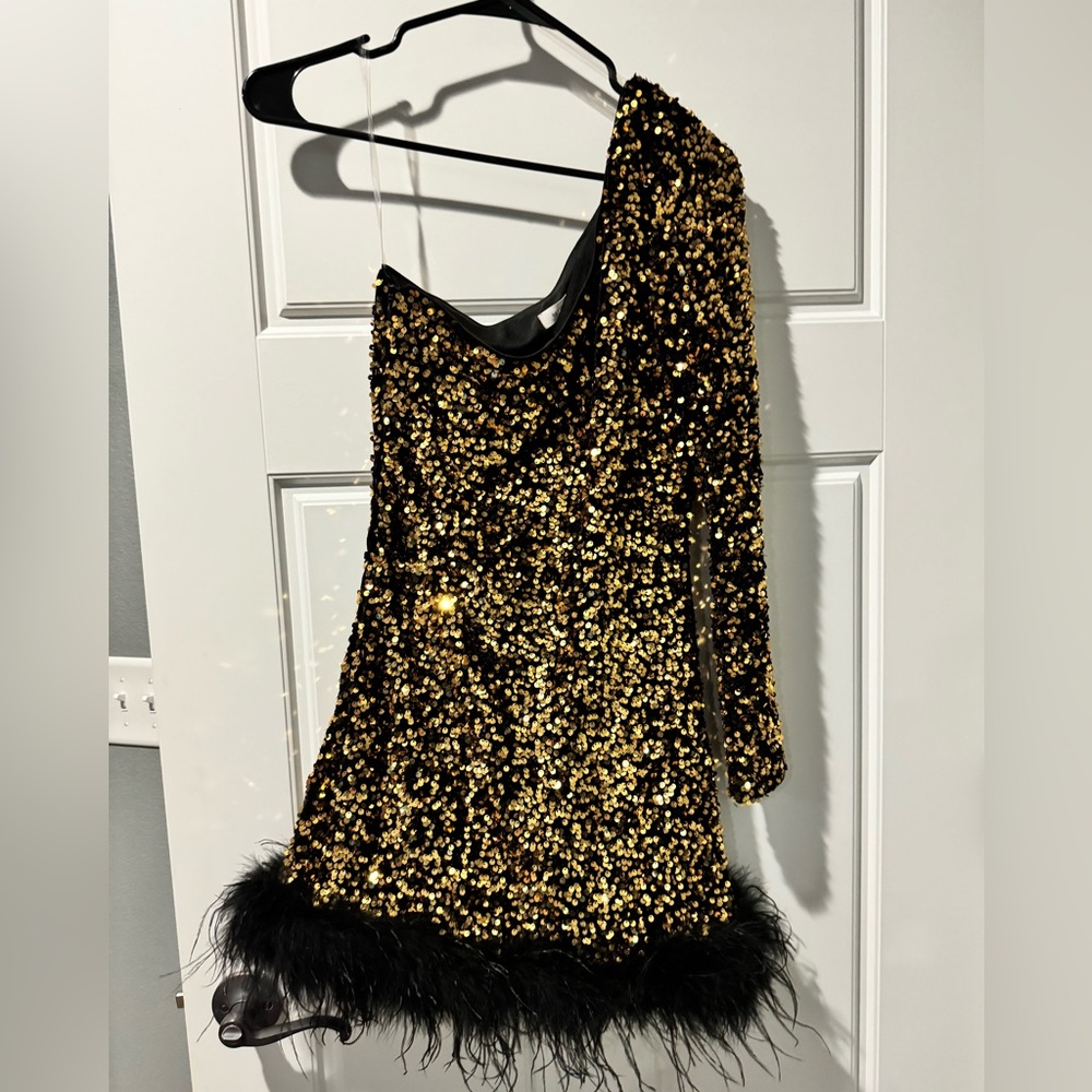 Beautiful black feathery gold homecoming dress!